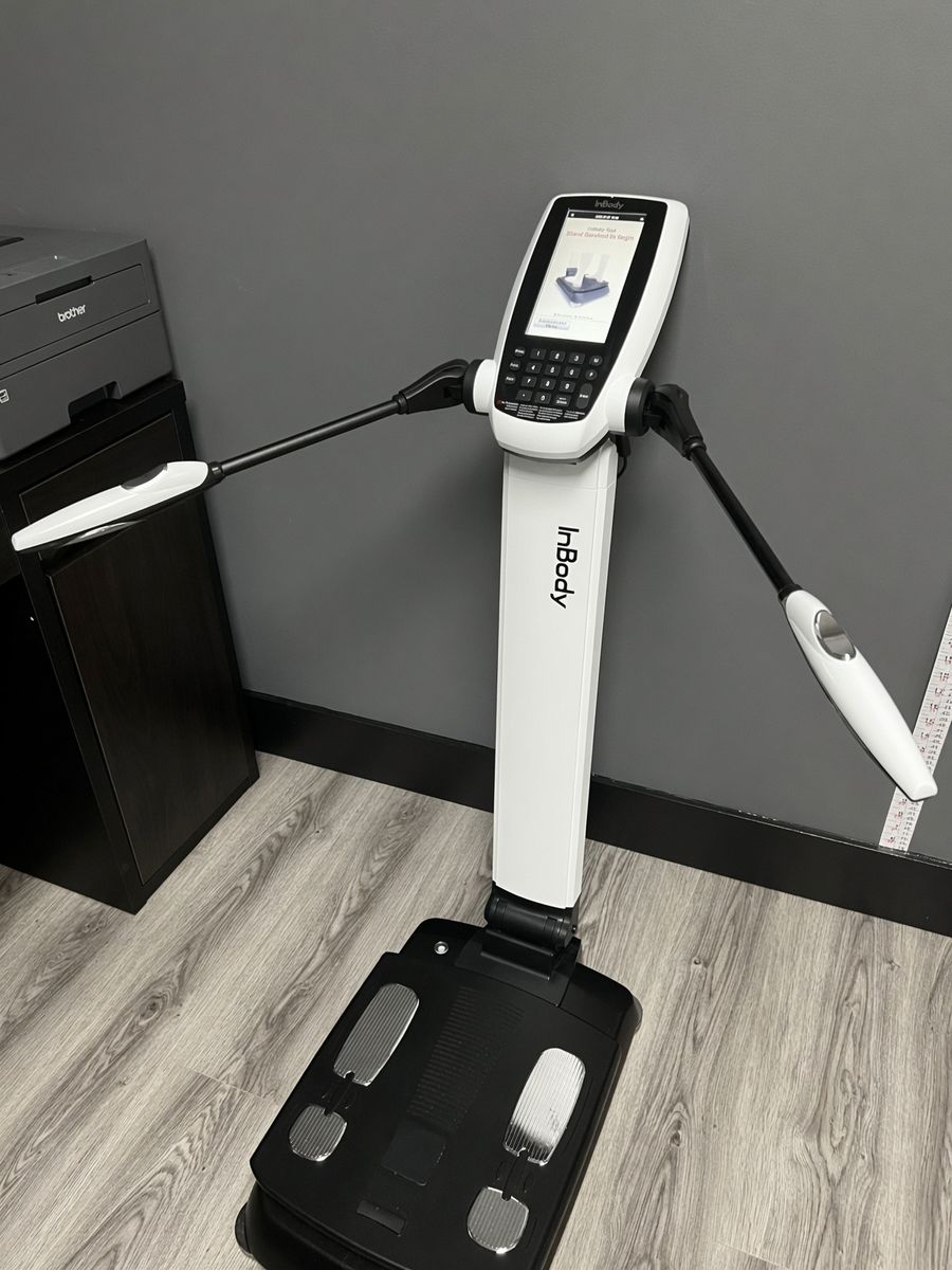 InBody body composition scanner at Game Day Men's Health West Oakville — measures fat versus muscle, not just weight